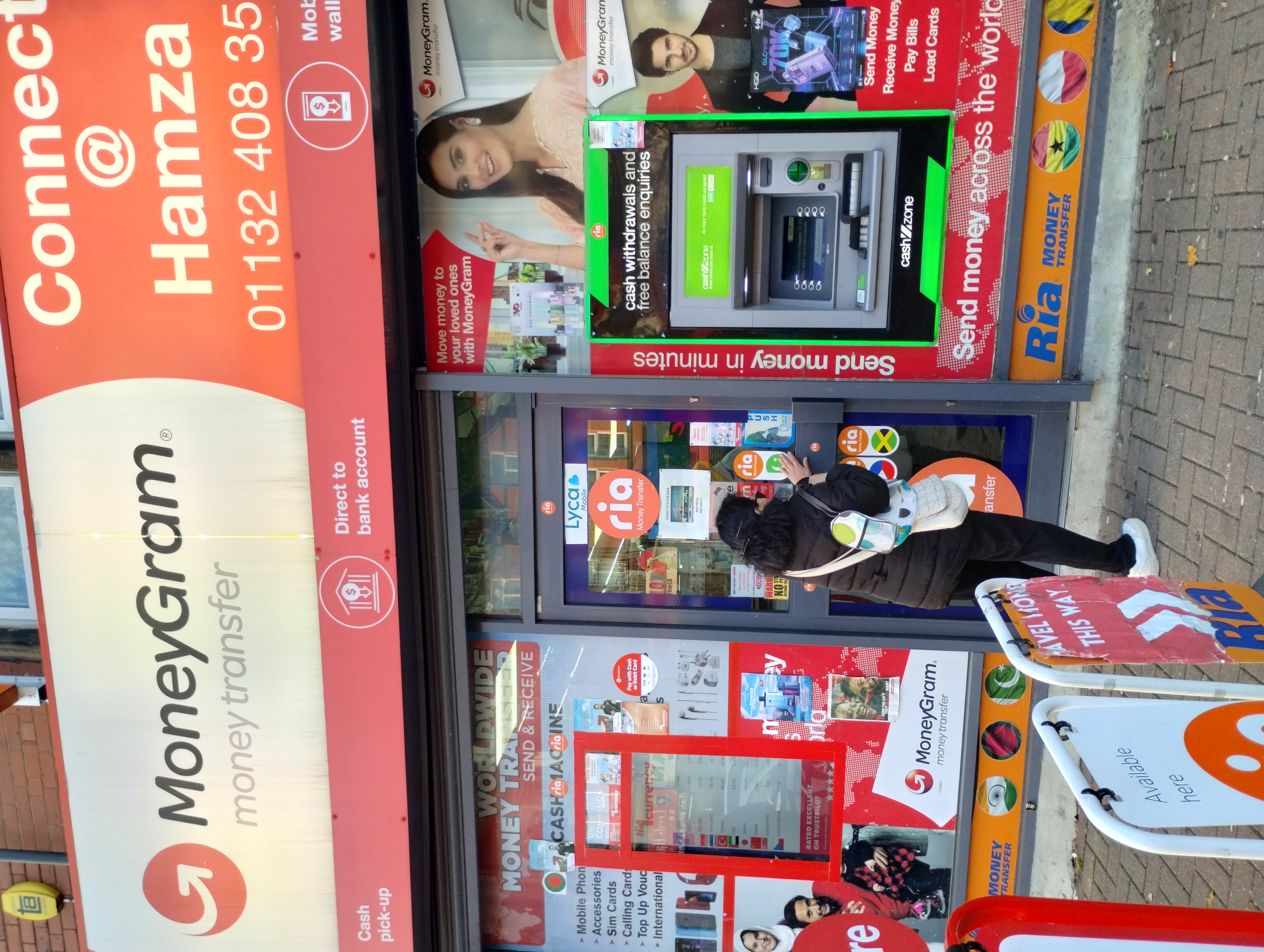 The front of the Connect @ Hamza store featuring No1 Currency Exchange in Harehills.