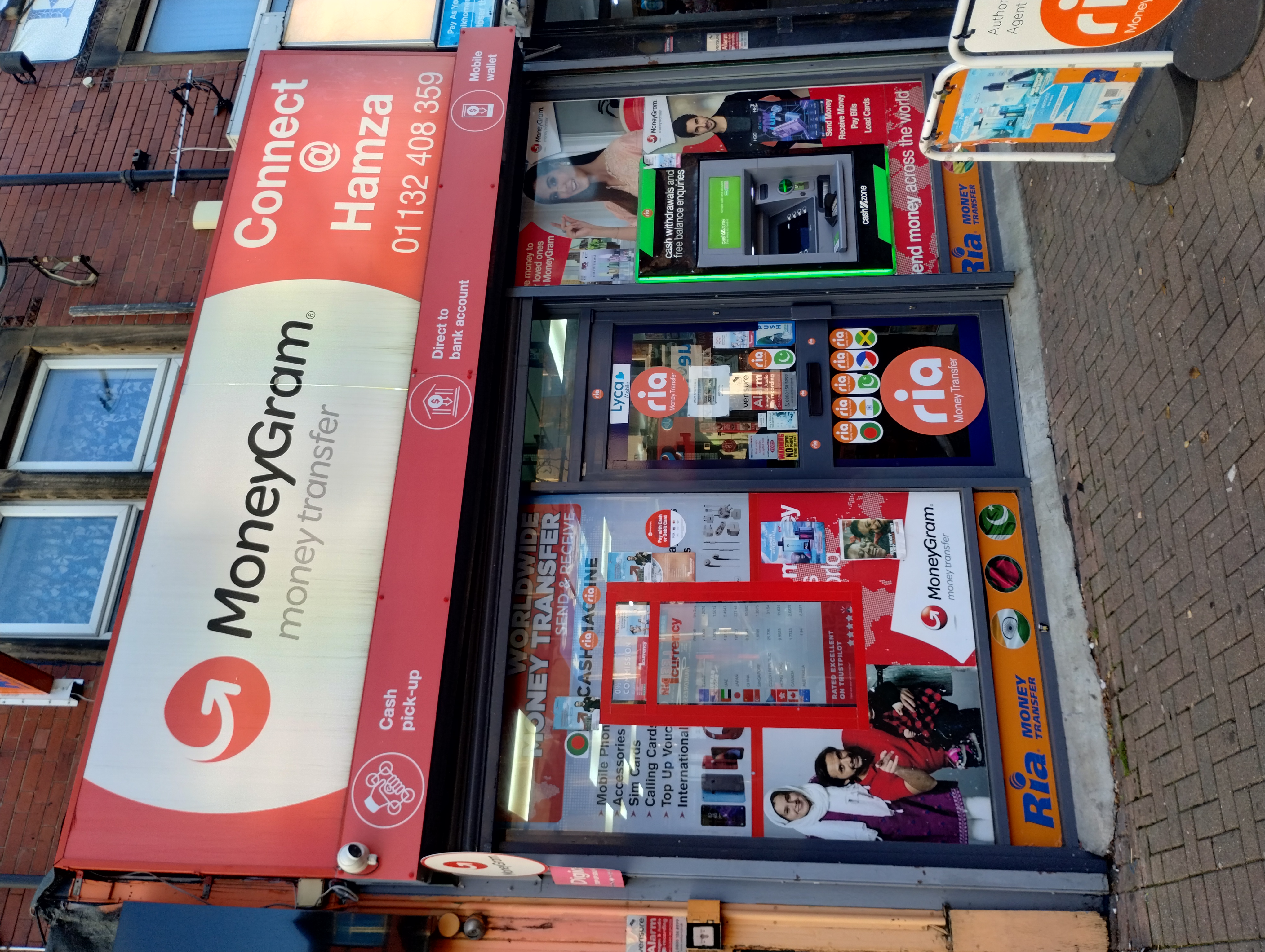 The front of the Connect @ Hamza store featuring No1 Currency Exchange in Harehills.