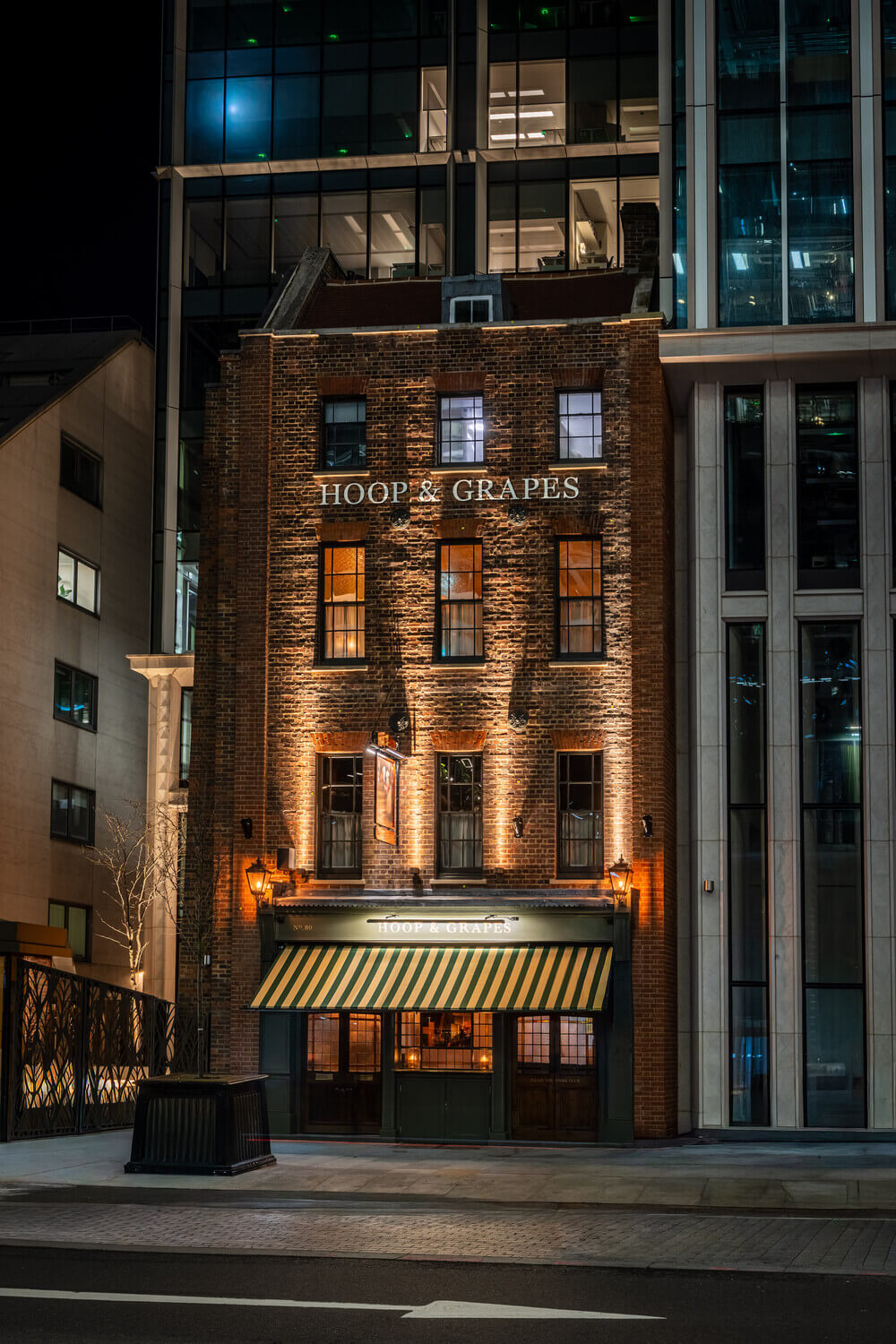 Outside the Hoop & Grapes Shepherd Neame pub in Farringdon, London