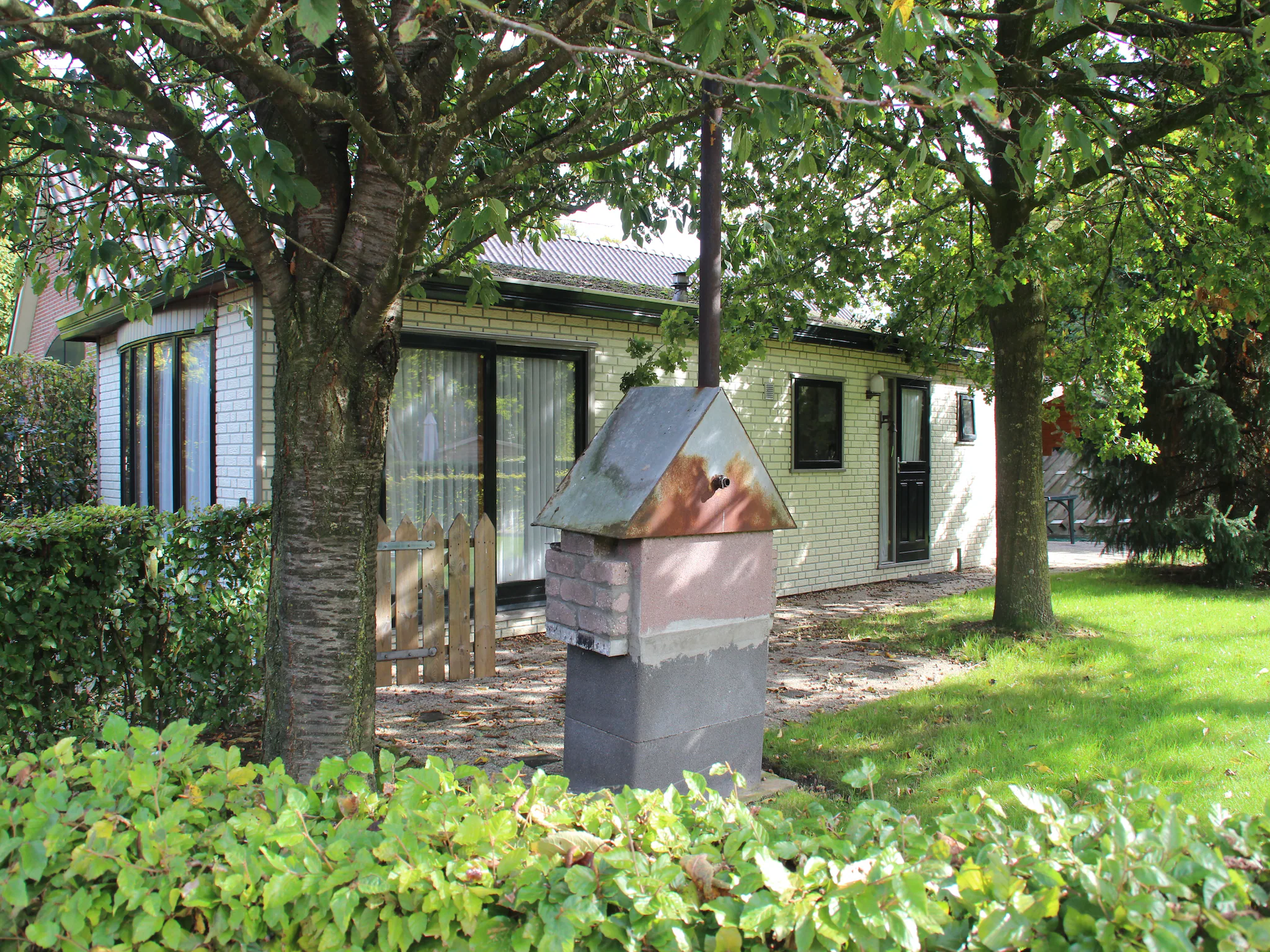 Foto's Schitterend chalet in Uden met een terras - Belvilla by Oyo