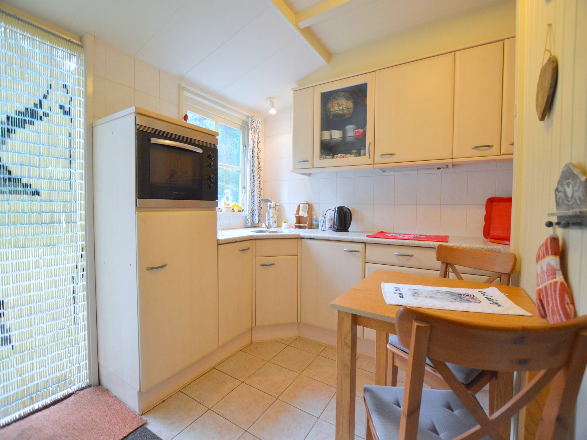 Foto's Houten vakantiehuis in Maarheeze midden op de heide - Belvilla by Oyo