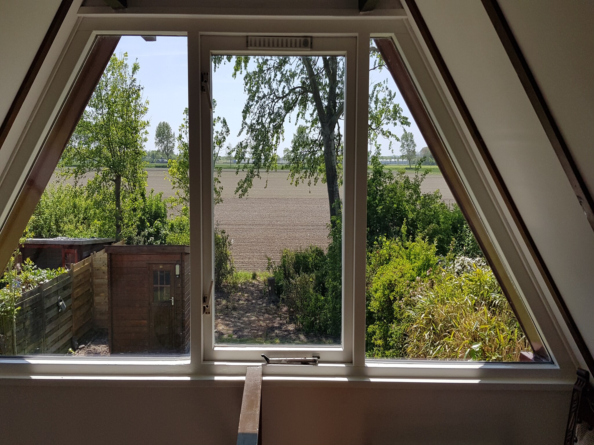 Foto's Huisje met weids uitzicht en tuin op het zuiden - Belvilla by Oyo