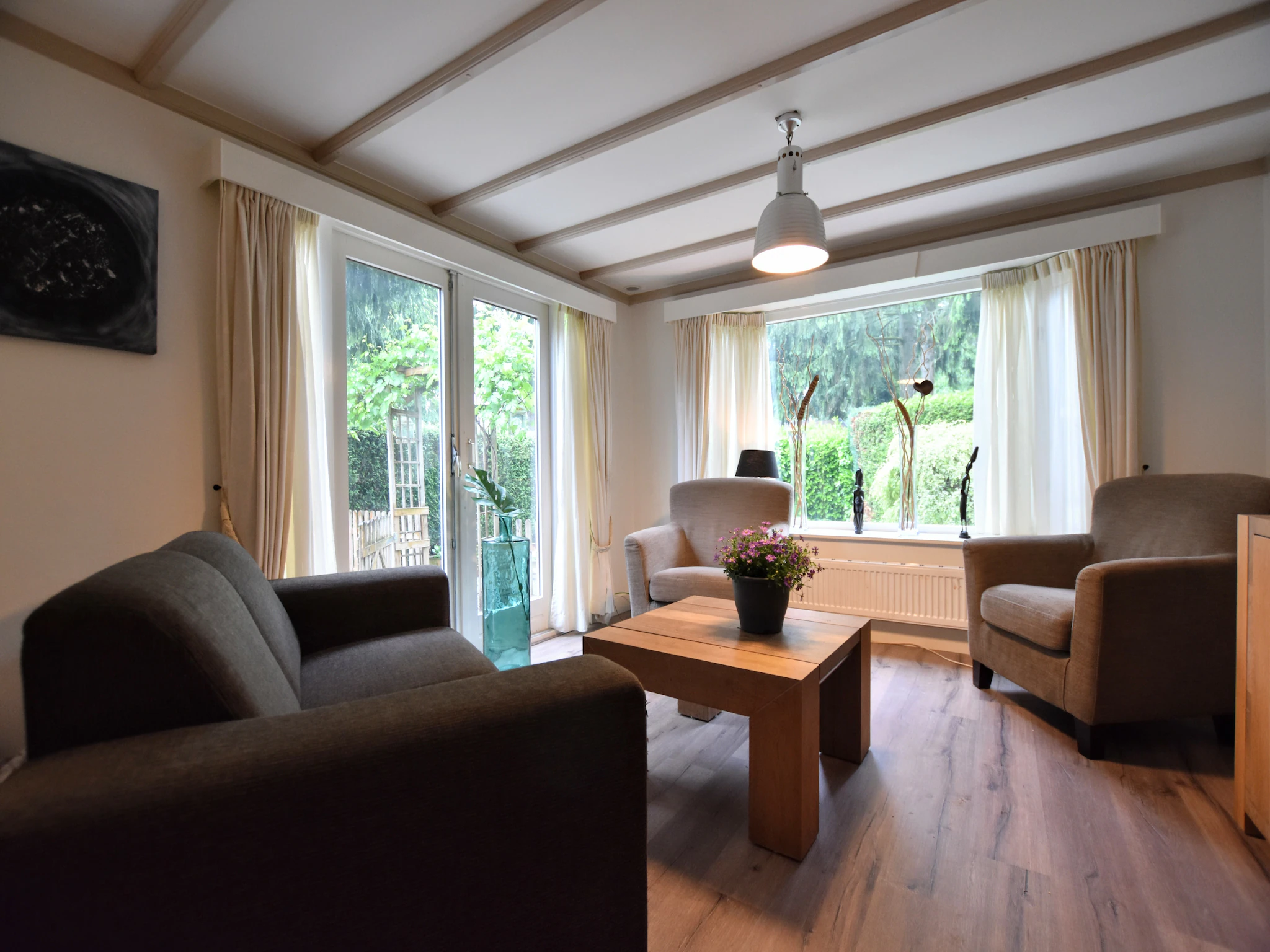 Foto's Chalet met eigen tuin en terrassen - Belvilla by Oyo
