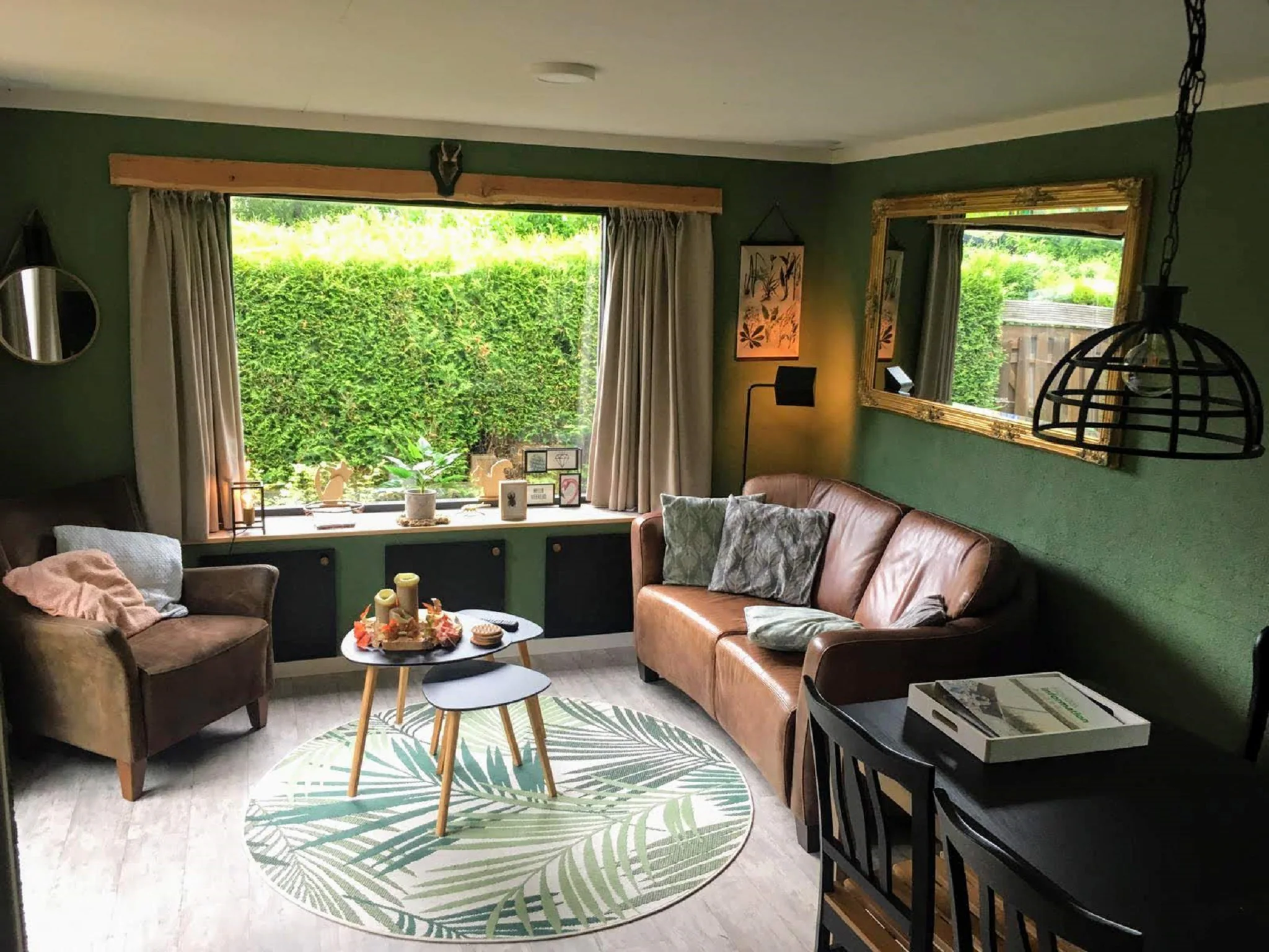 Foto's Sfeervolle chalet op de Veluwe met veranda en omheinde tuin - Belvilla by Oyo