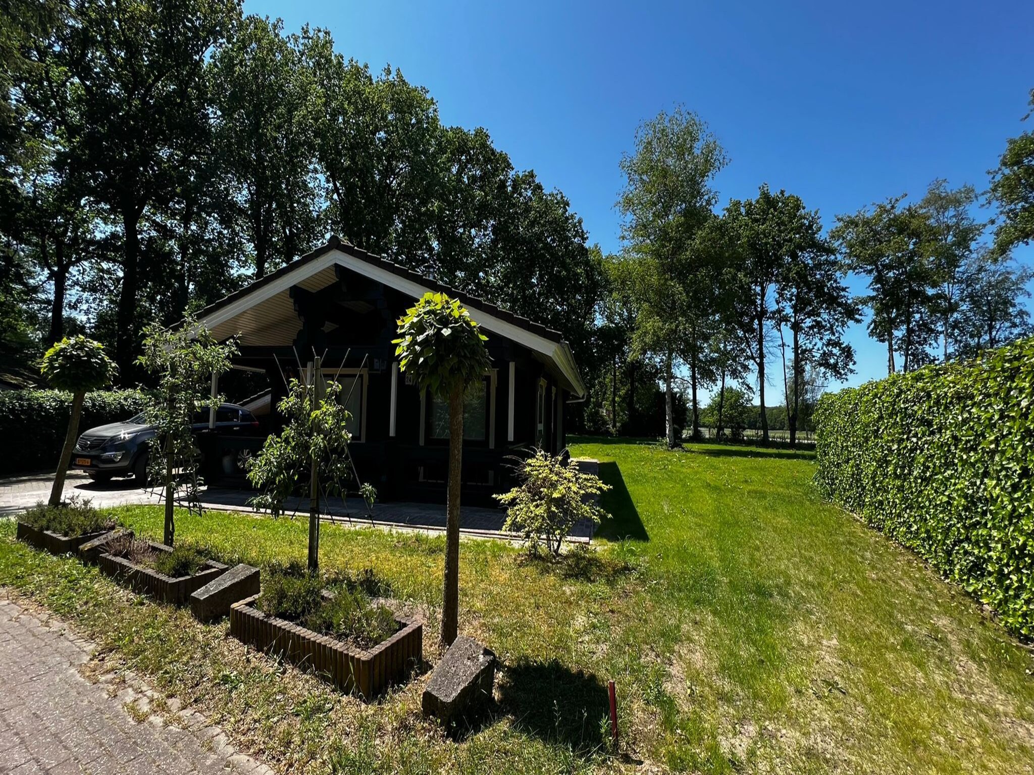 Foto's Finse chalet met privÃ© tuin en houtgestookte sauna nabij de Veluwe - Belvilla by Oyo