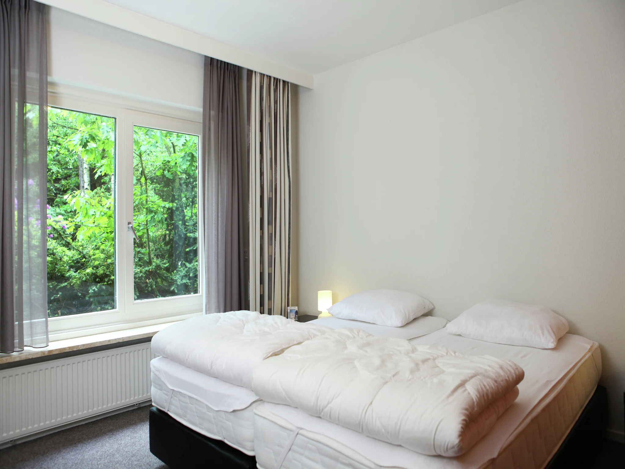 Foto's Moderne vakantievilla nabij de Veluwe met bubbelbad - Belvilla by Oyo