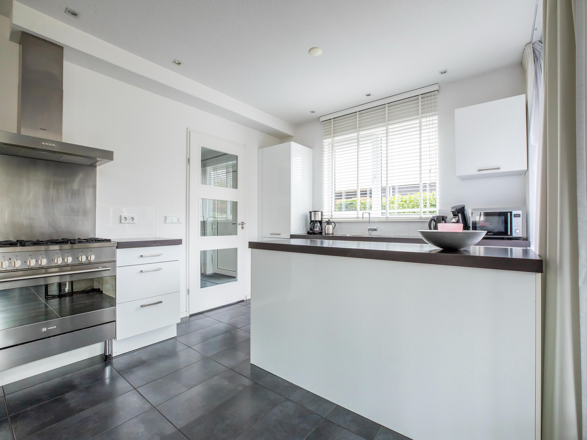 Foto's Moderne villa in Harderwijk met bubbelbad - Belvilla by Oyo