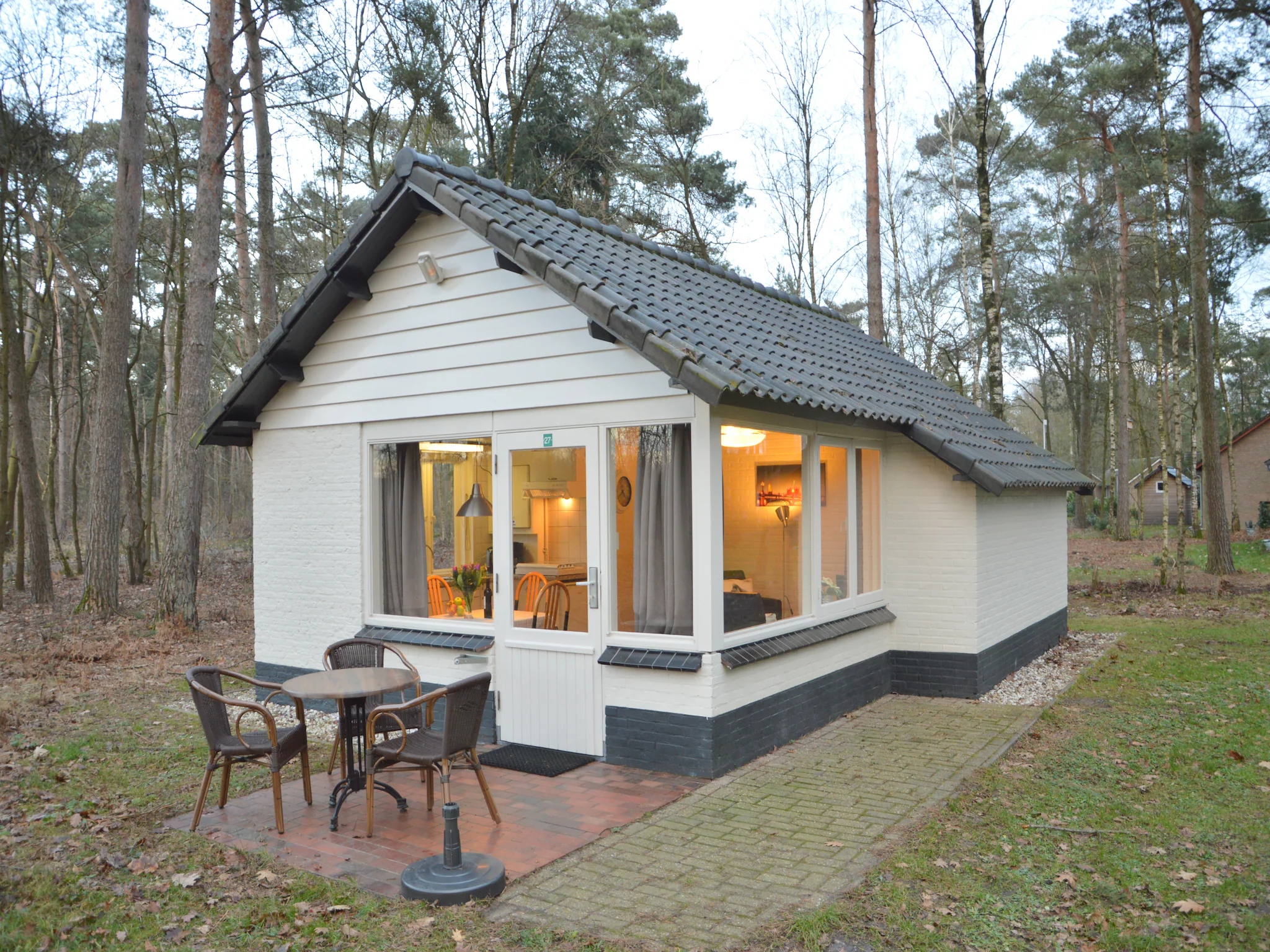 Foto's bungalow op een natuurrijkpark aan een groot ven - Belvilla by Oyo