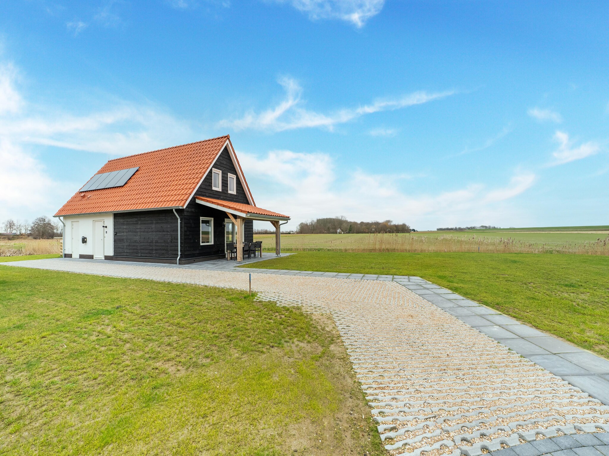 Foto's Luxe villa aan de Oosterschelde met sauna en schitterend uitzicht. - Belvilla by Oyo