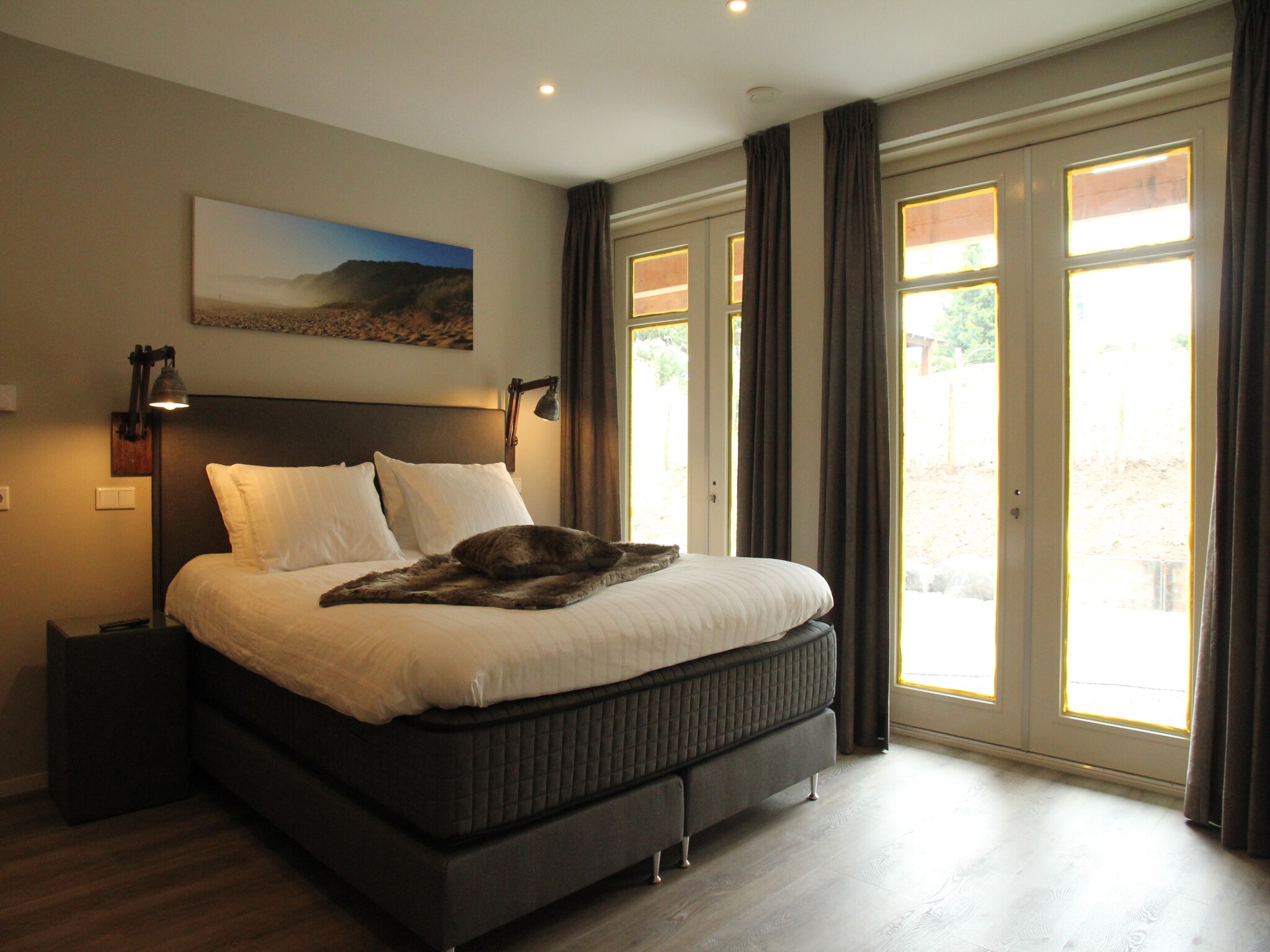 Foto's Luxe duinvilla in Noordwijk met zwemvijver - Belvilla by Oyo