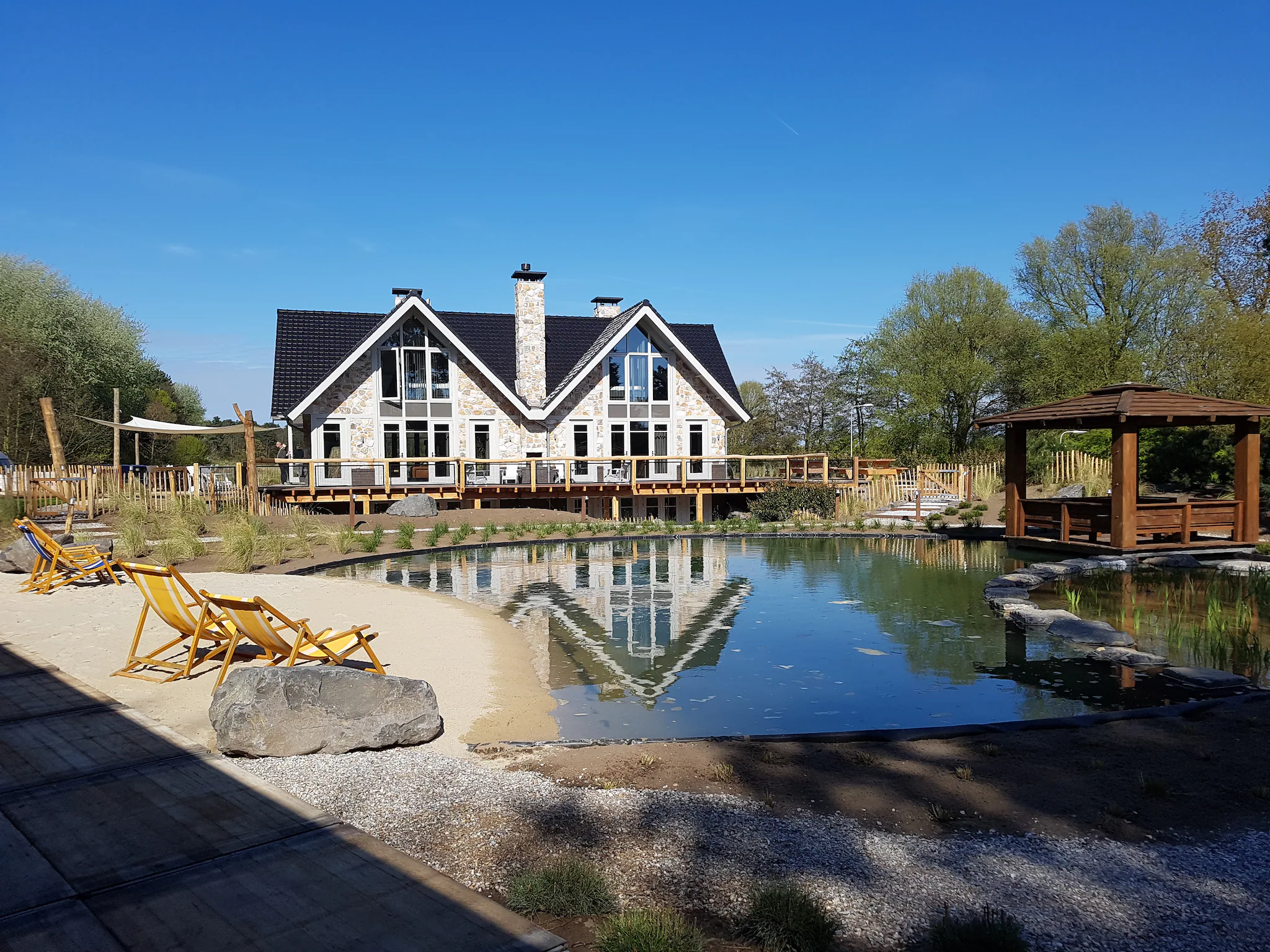 Foto's Luxe duinvilla in Noordwijk met zwemvijver - Belvilla by Oyo