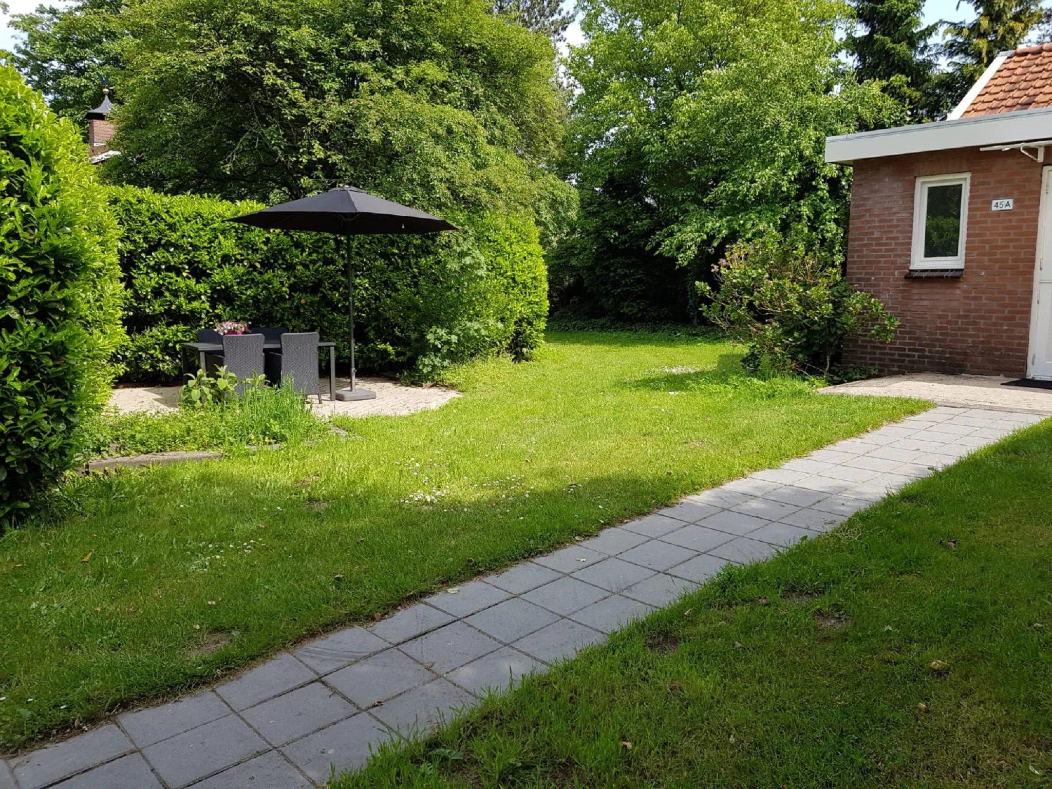 Foto's Knusse vakantiewoning in Garderen met privÃ©terras - Belvilla by Oyo