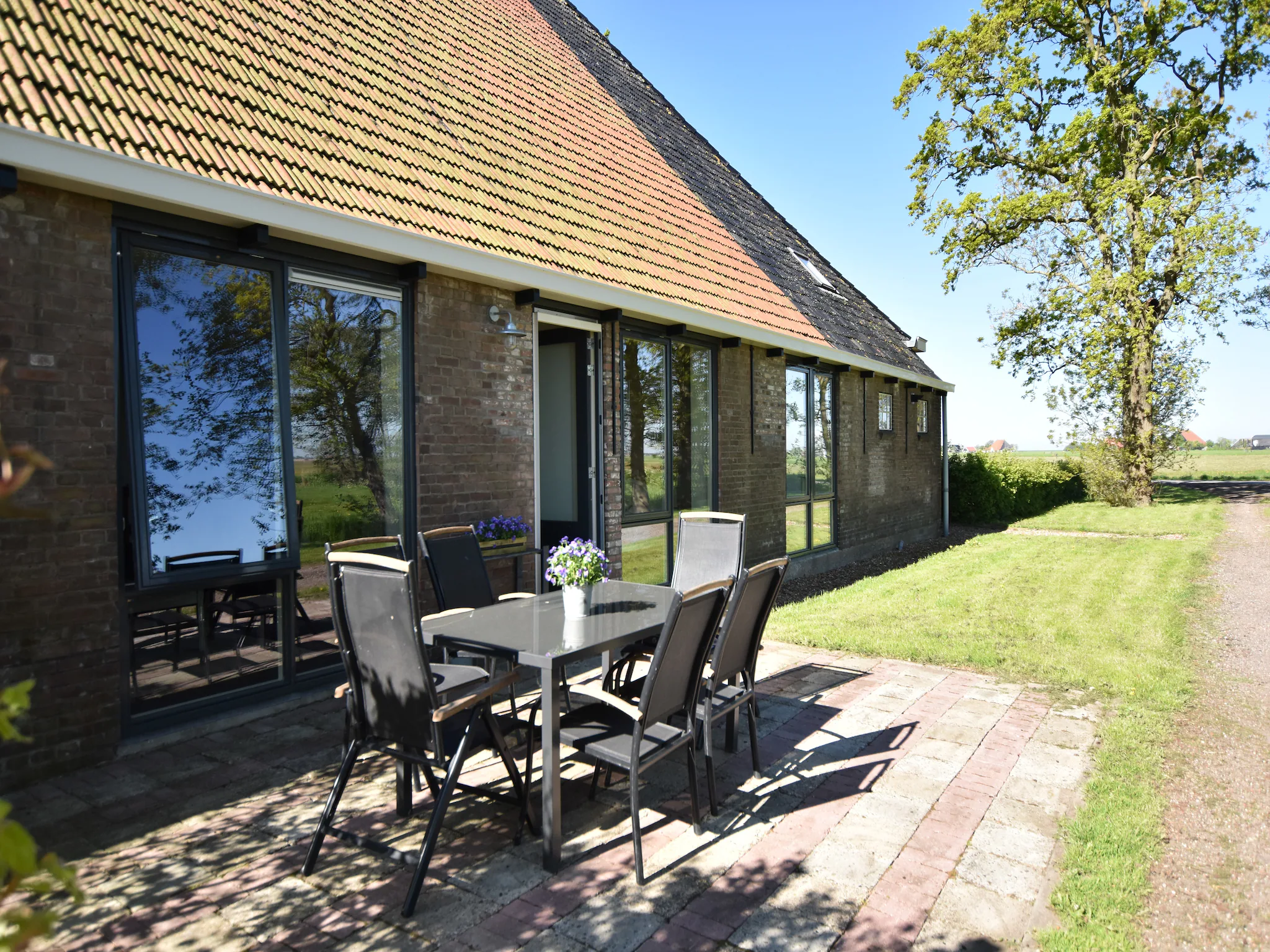 Foto's Vakantiehuis met heerlijk zonnig terras - Belvilla by Oyo