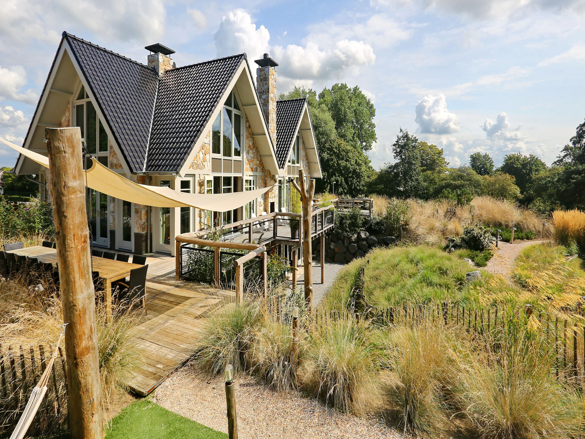 Foto's Luxe duinvilla in Noordwijk met zwemvijver - Belvilla by Oyo