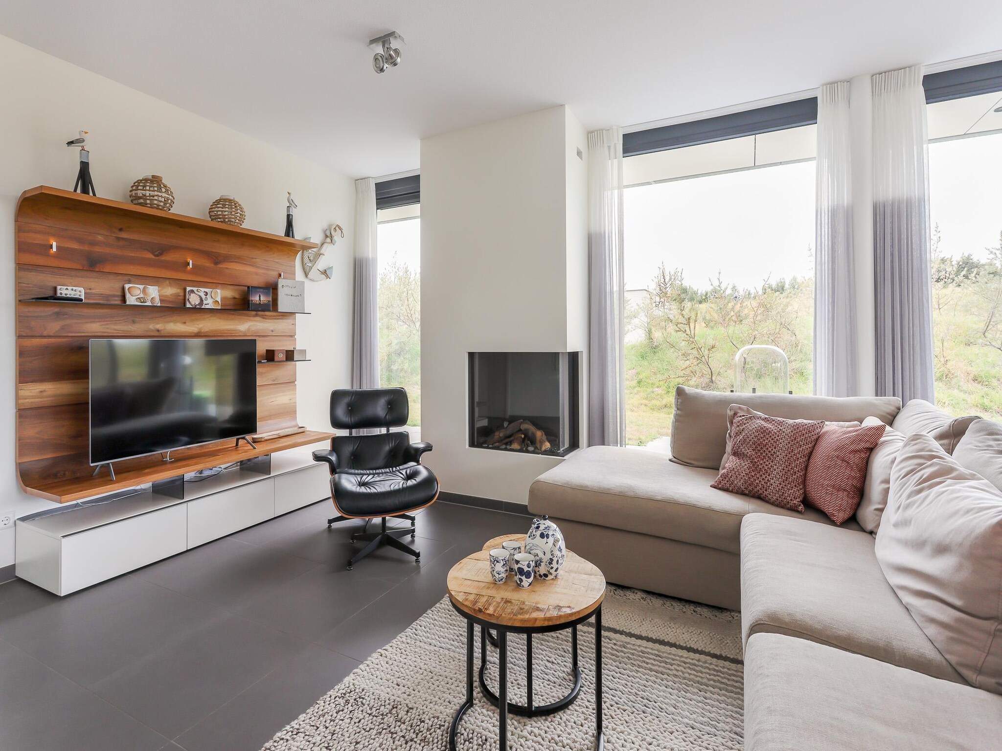 Foto's Vakantiehuis bij het Banjaardstrand met een prachtige tuin - Belvilla by Oyo