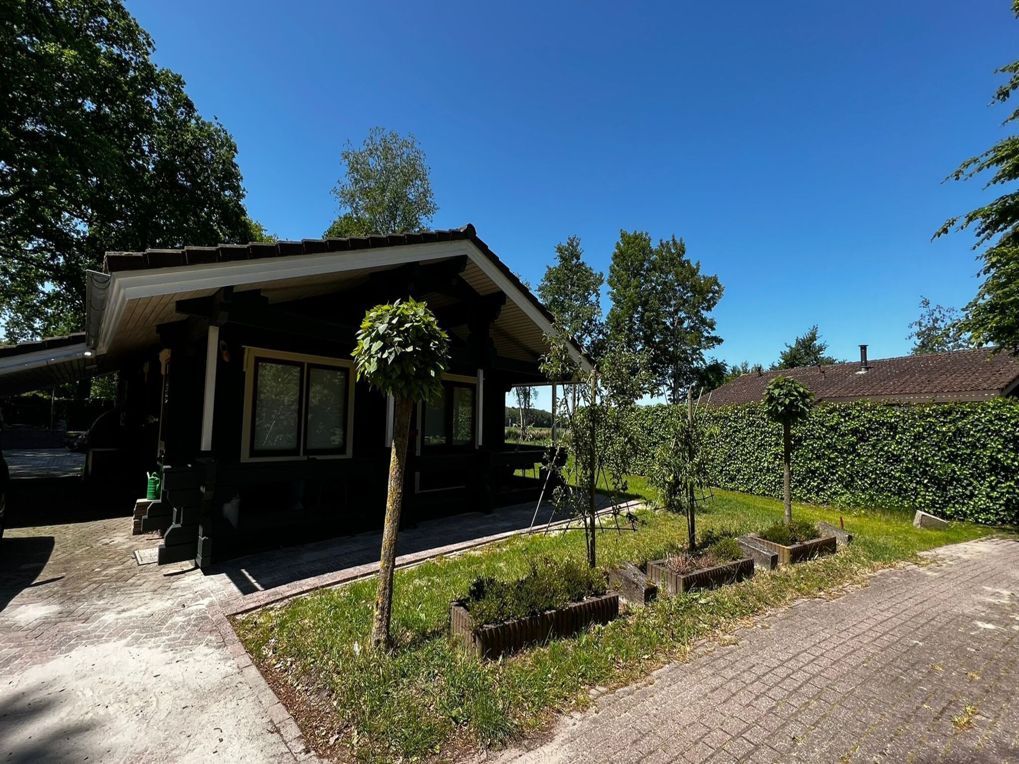 Foto's Finse chalet met privÃ© tuin en houtgestookte sauna nabij de Veluwe - Belvilla by Oyo