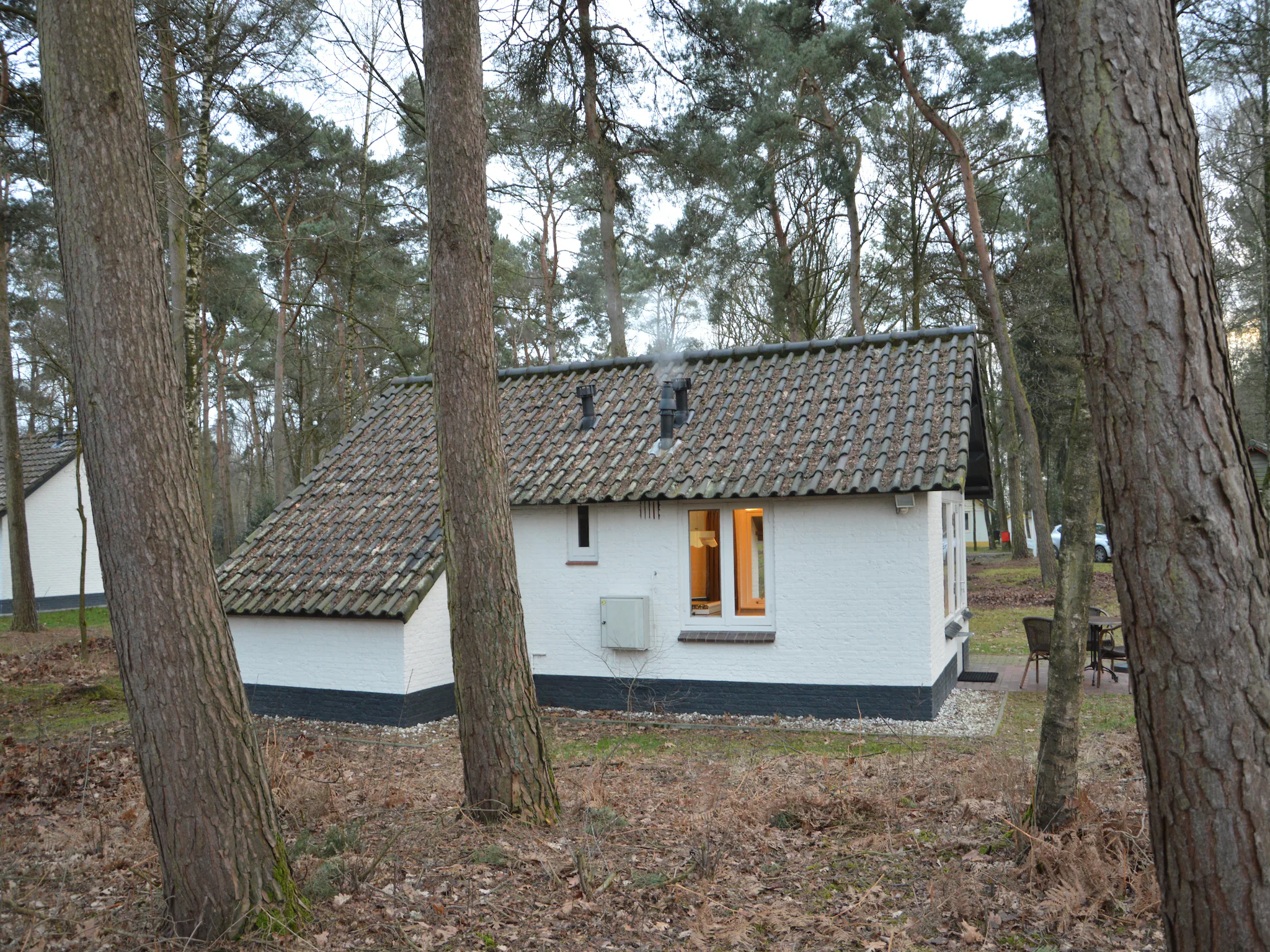 Foto's bungalow op een natuurrijkpark aan een groot ven - Belvilla by Oyo