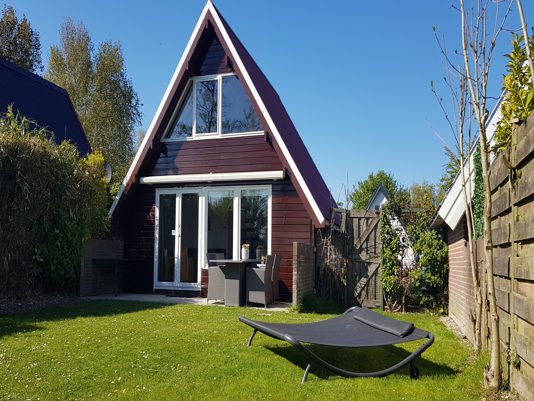 Foto's Huisje met weids uitzicht en tuin op het zuiden - Belvilla by Oyo