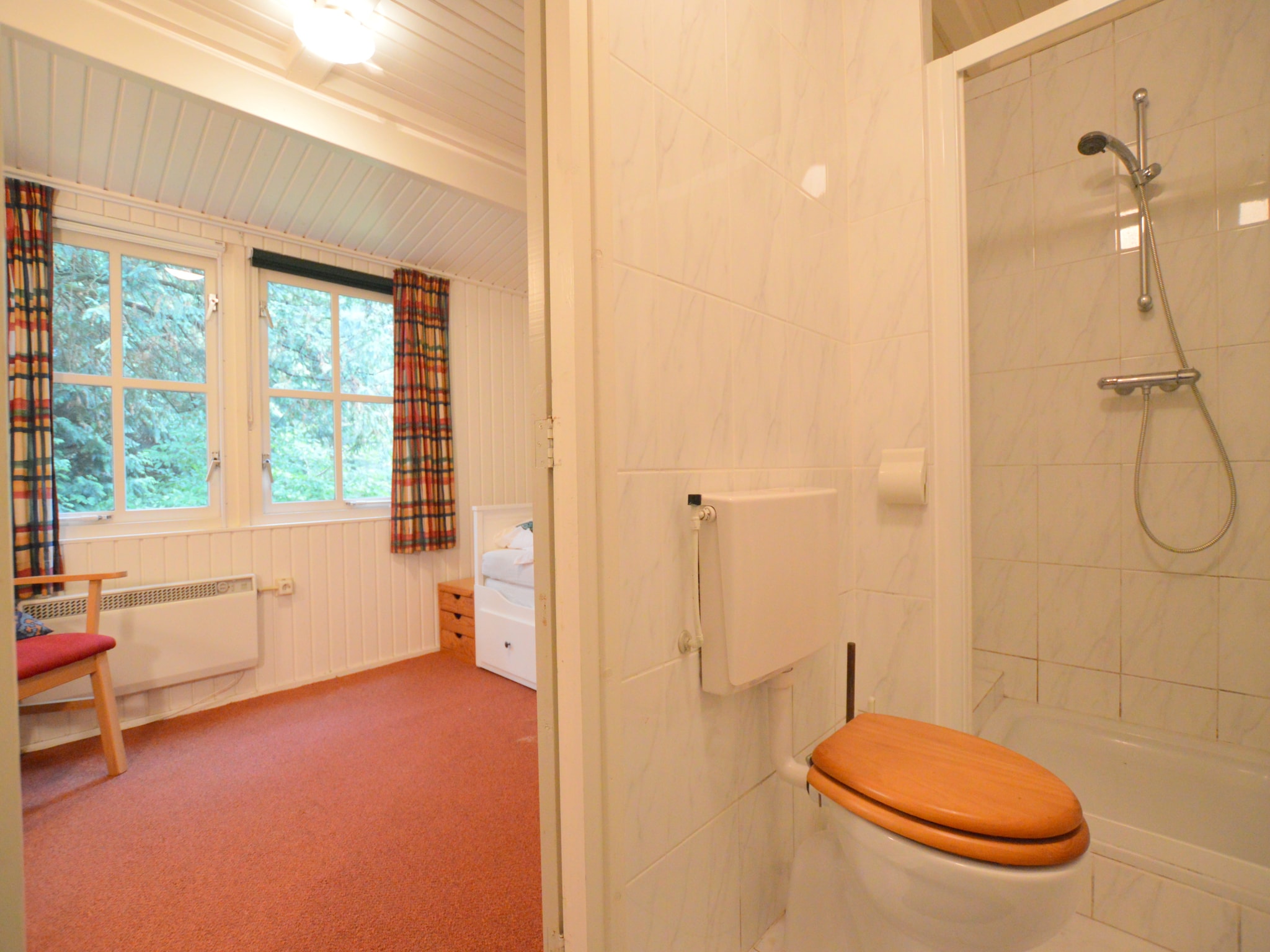 Foto's Houten vakantiehuis in Maarheeze midden op de heide - Belvilla by Oyo