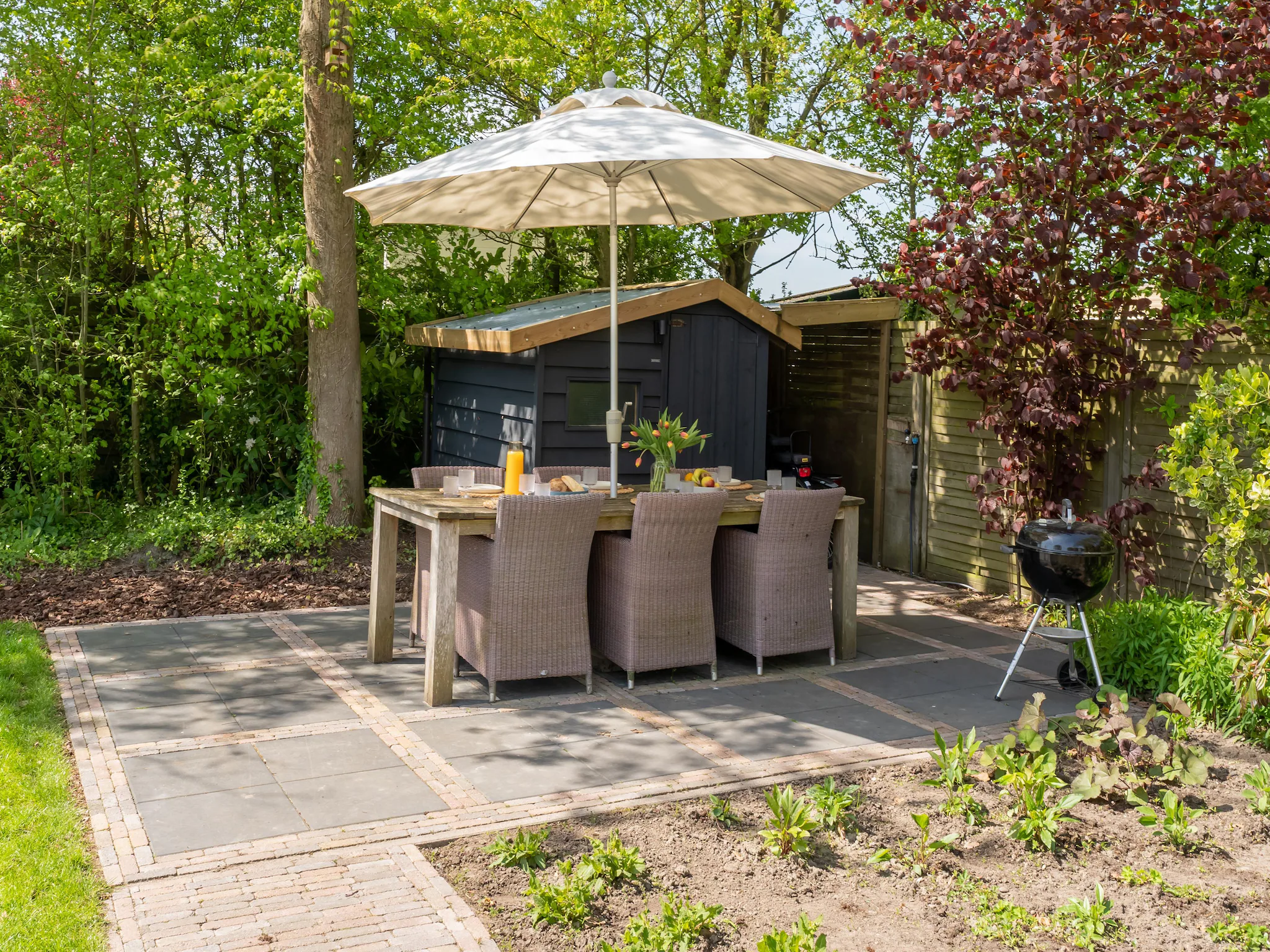 Foto's Luxe chalet bij Ouddorp met tuin - Belvilla by Oyo