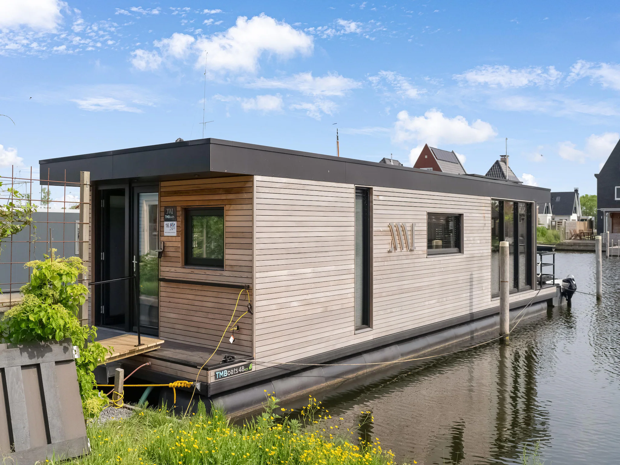 Foto's Boathouse aan het water in Stavoren met een tuin - Belvilla by Oyo