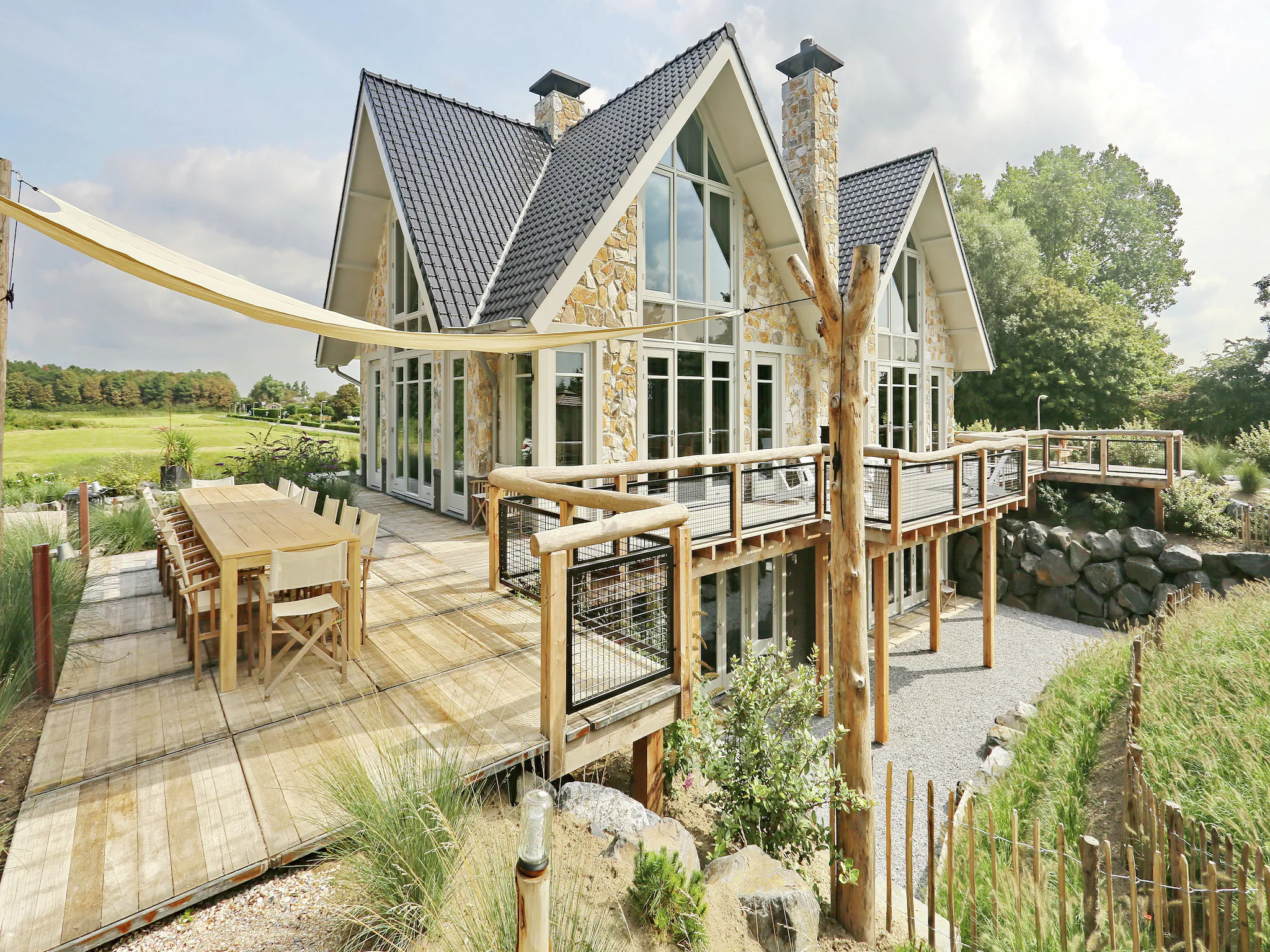 Foto's Luxe duinvilla in Noordwijk met zwemvijver - Belvilla by Oyo