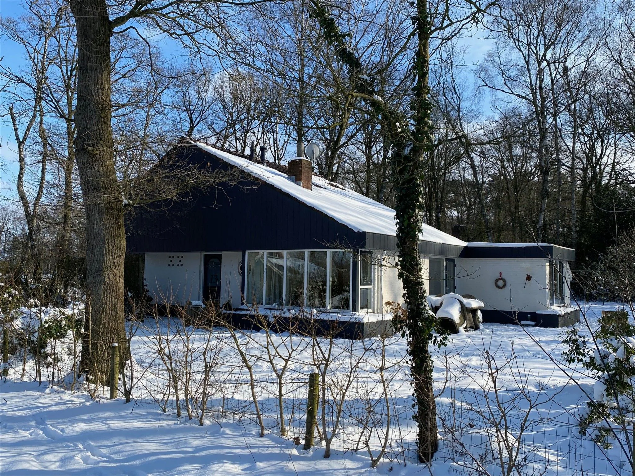Foto's Vrijstaande villa in Haaksbergen met open haard - Belvilla by Oyo