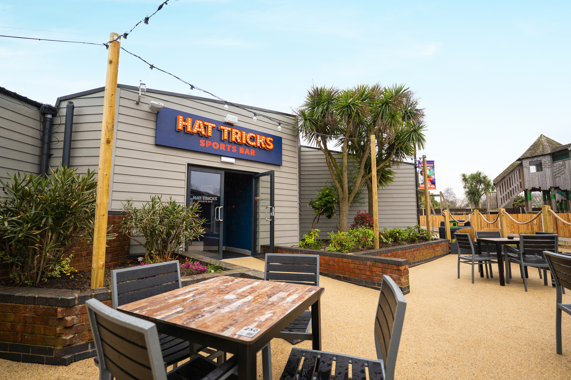 Hat Tricks bar outdoor seating at Vauxhall Holiday Park